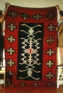 Navajo rug (catalog number 0392-0024) donated to the museum in 1947 to be used as office decorations. Instead, they were accessioned into the collection.
